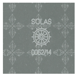Close-up of 1403 Oralite SOLAS reflective tape showing the certified ship's wheel watermark pattern